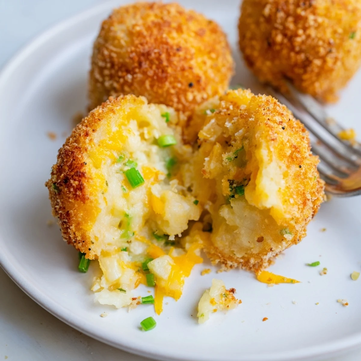Crispy Fried Mashed Potato Balls served with cool ranch and spicy ketchup