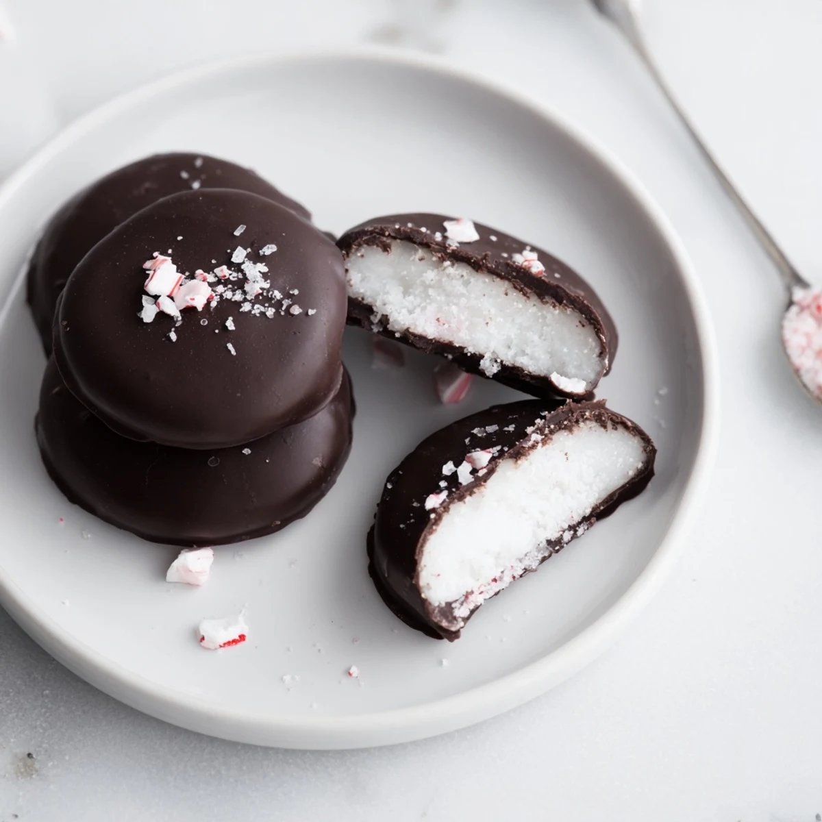 Stacked Peppermint Patties ready for gifting, speckled with crushed candy garnish