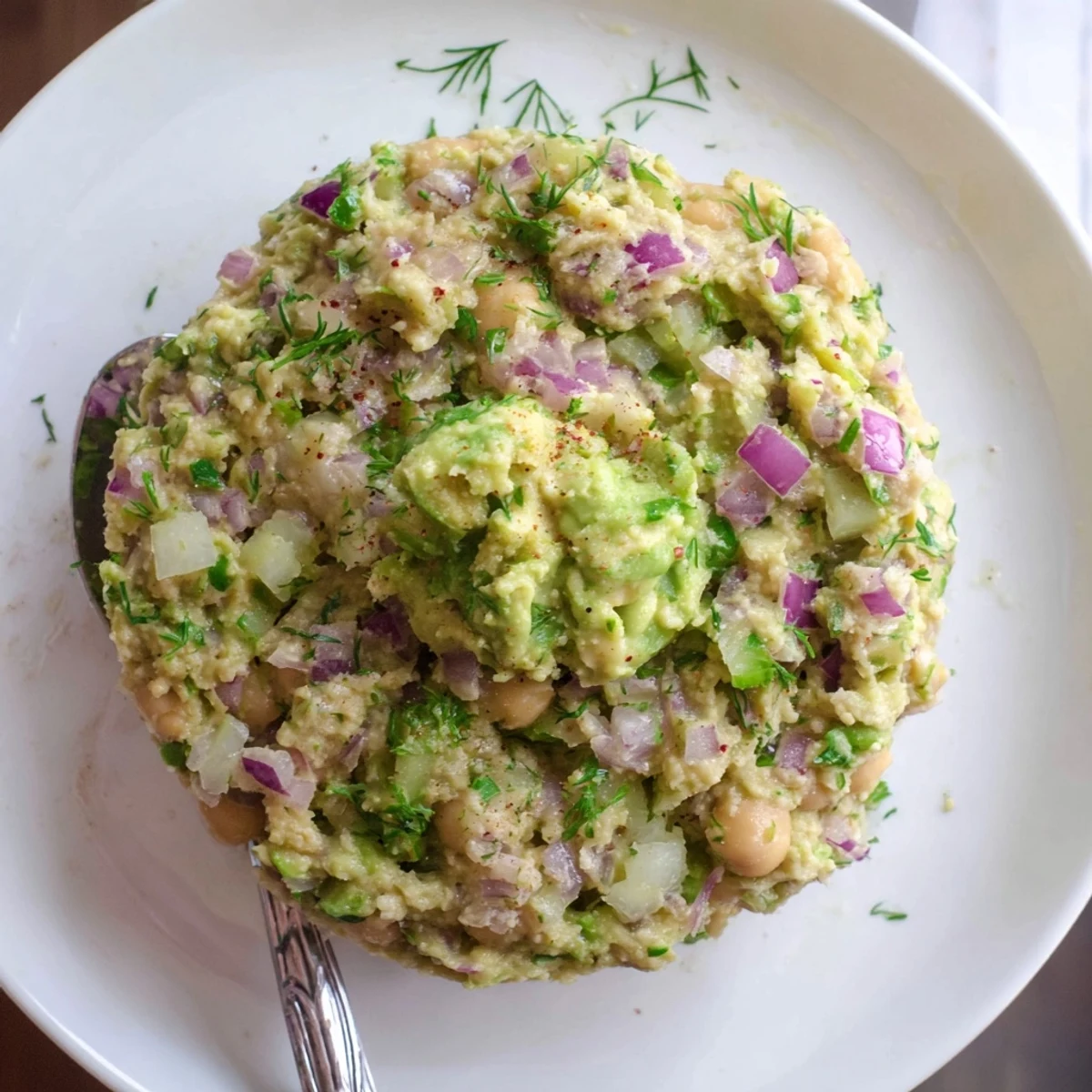 Creamy Smashed Chickpea Avocado Pickle on toast, tangy crunch and herbs.